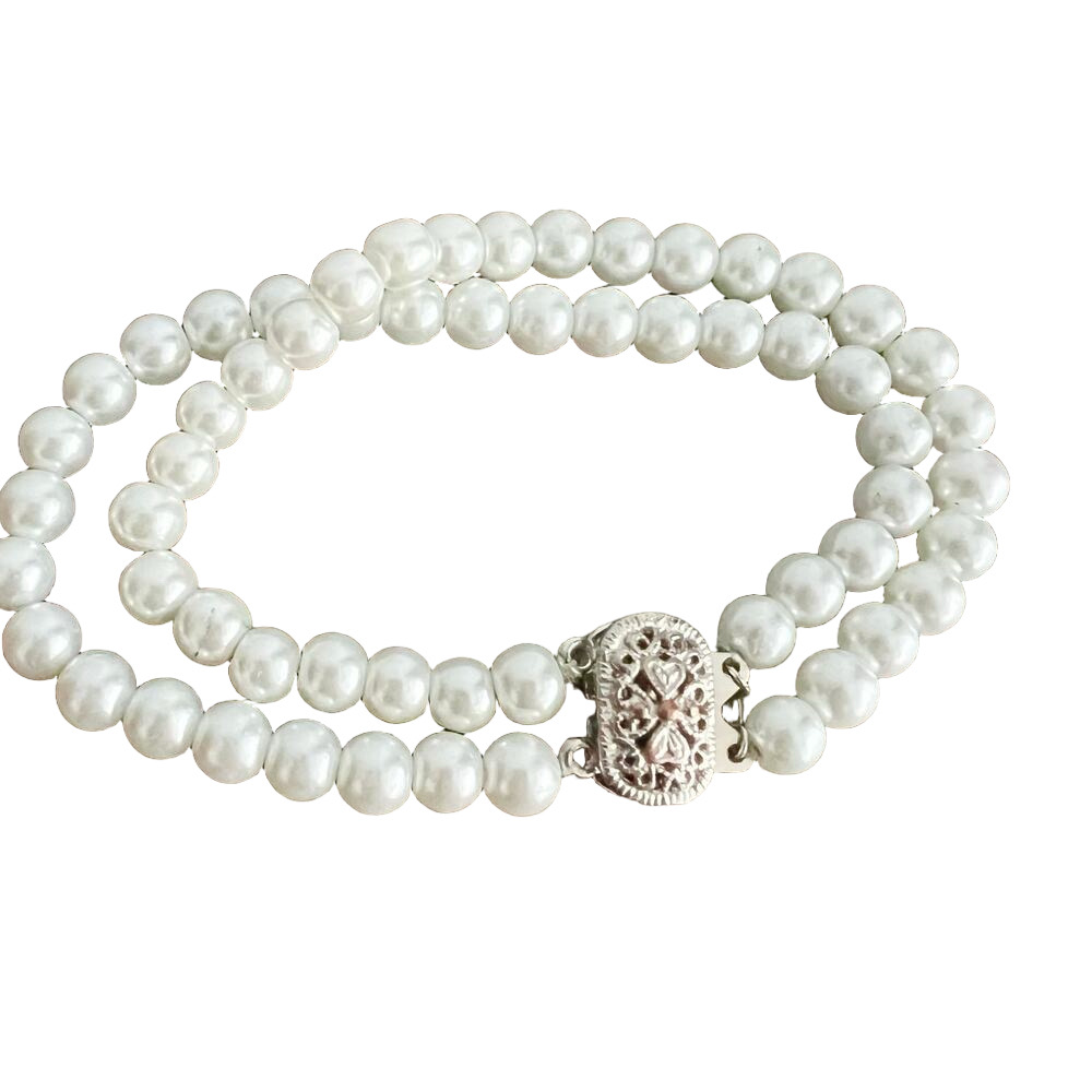 Vintage double strand pearl bracelet with silver tone fish hook clasp